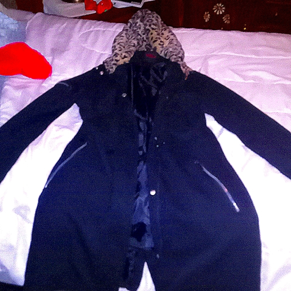 A long black jacket this jacket is from Yoki size is large